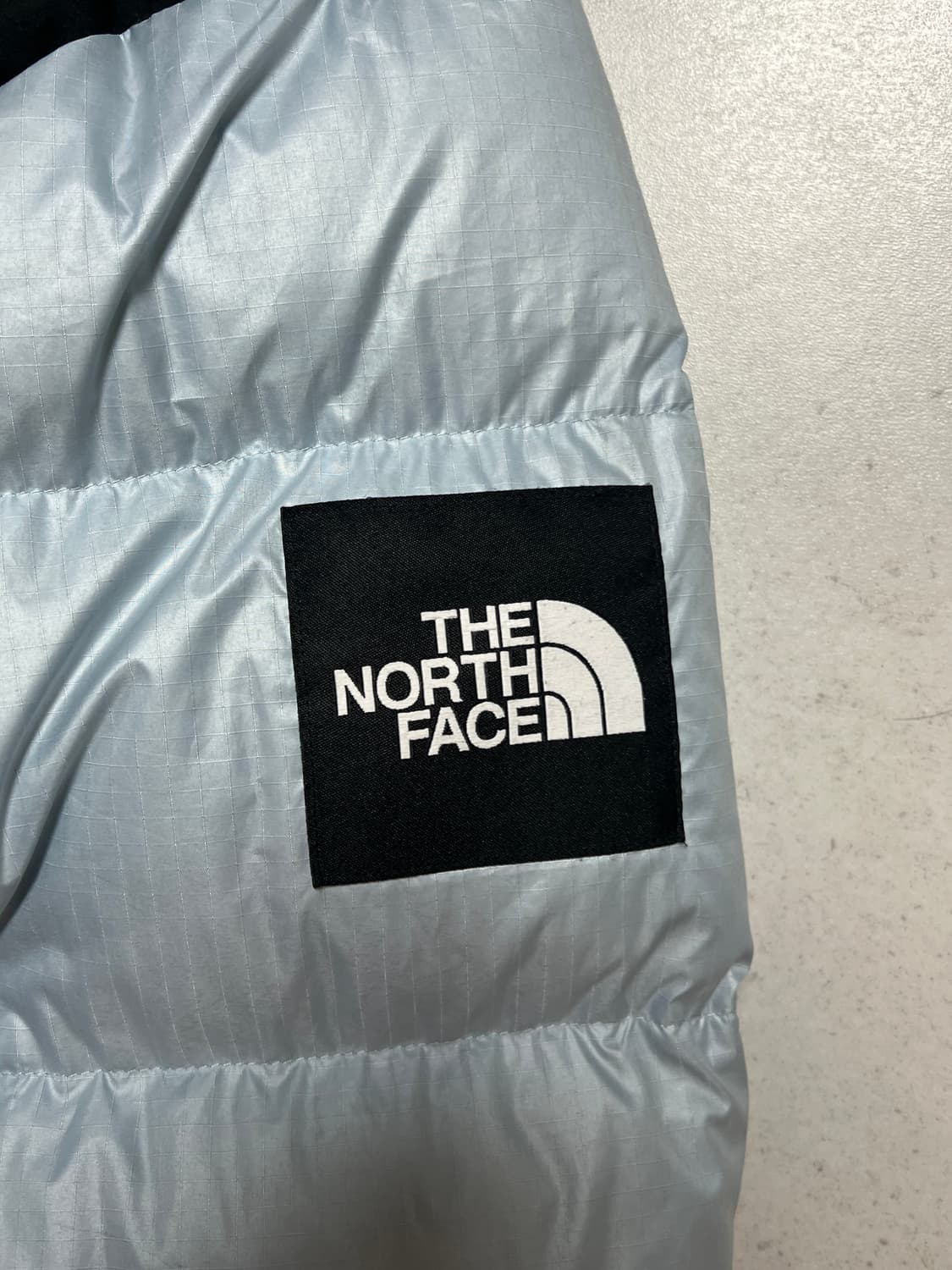 노스페이스 화이트라벨 눕시 스카이블루 패딩  상품이미지4