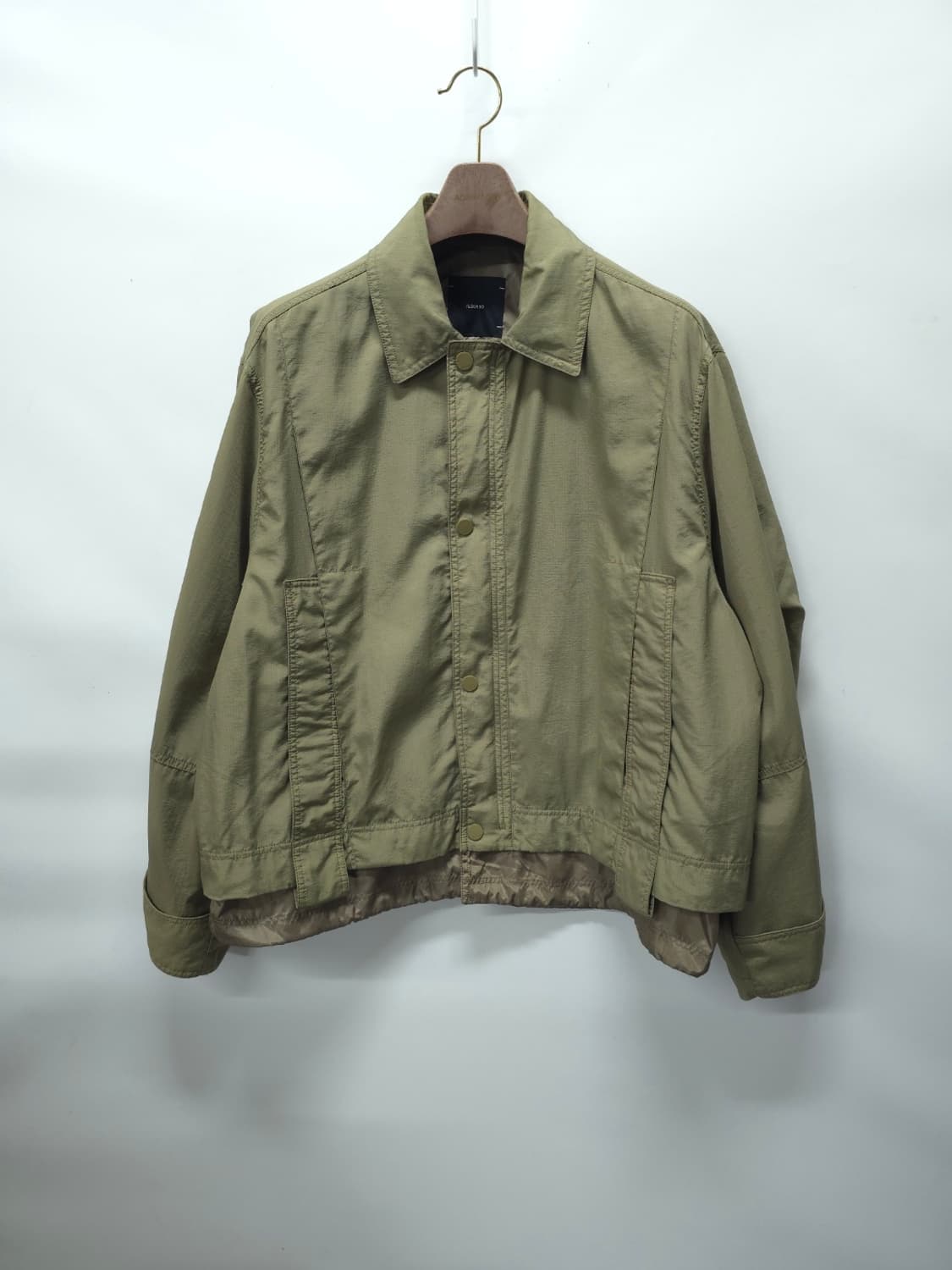 일꼬르소 레이어드 하단 스트링 나일론 자켓 카키(110) 상품이미지1