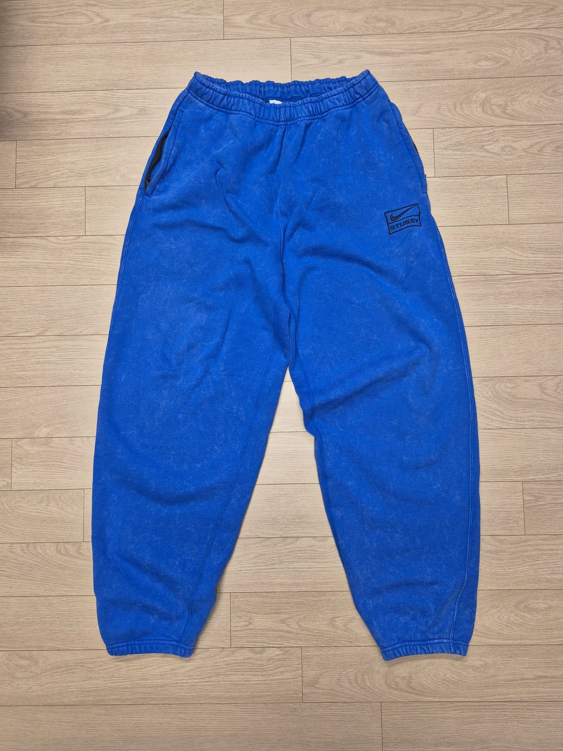 나이키 x 스투시 NRG 에시드 워시드 플리스 팬츠 게임 로얄 상품이미지1