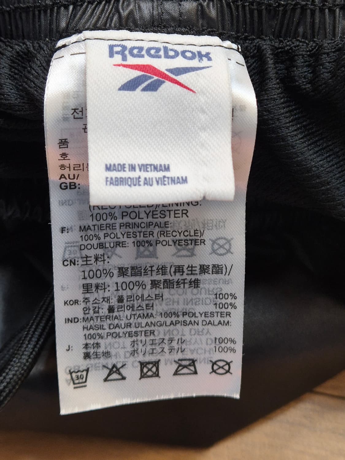 블랙 색상의 리복 트레이닝 바지입니다. 사이즈는 L이고, 허리둘레는 72 상품이미지3