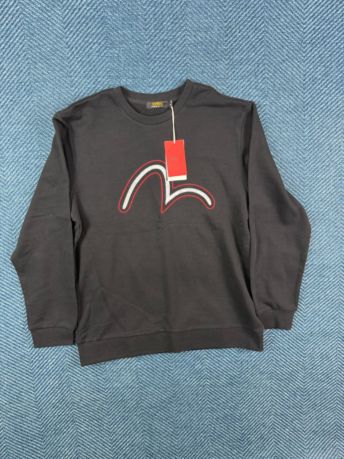 EVISU 프리미엄 그래픽 맨투맨: 완성도 높은 실루엣의 미학 상품이미지1