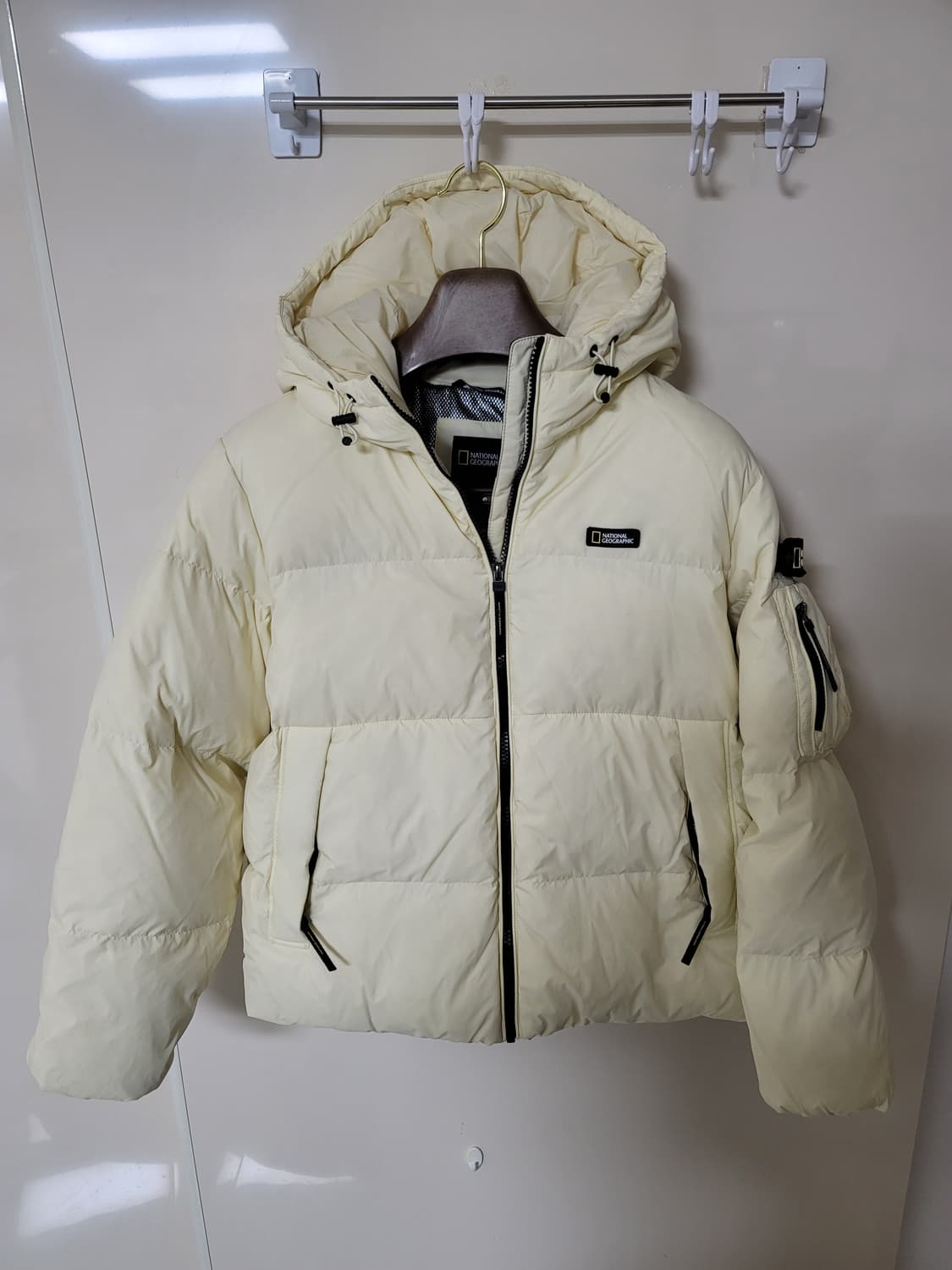 내셔널지오그래픽 구스다운패딩 아이보리 95사이즈 상태굿 상품이미지1