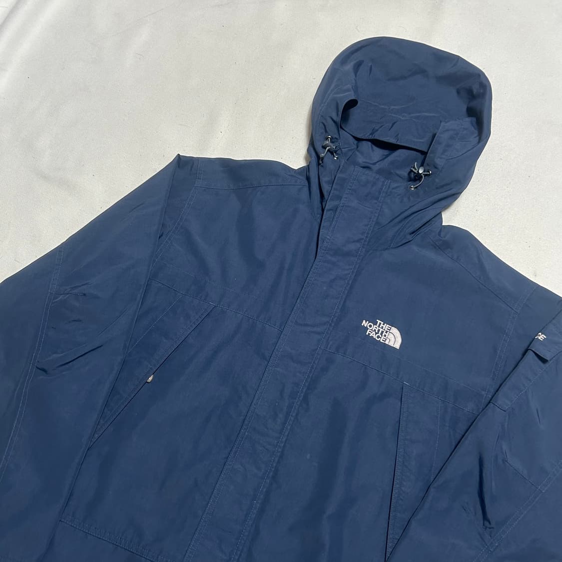 100 노스페이스 암포켓 네이비 후드 바람막이  상품이미지1