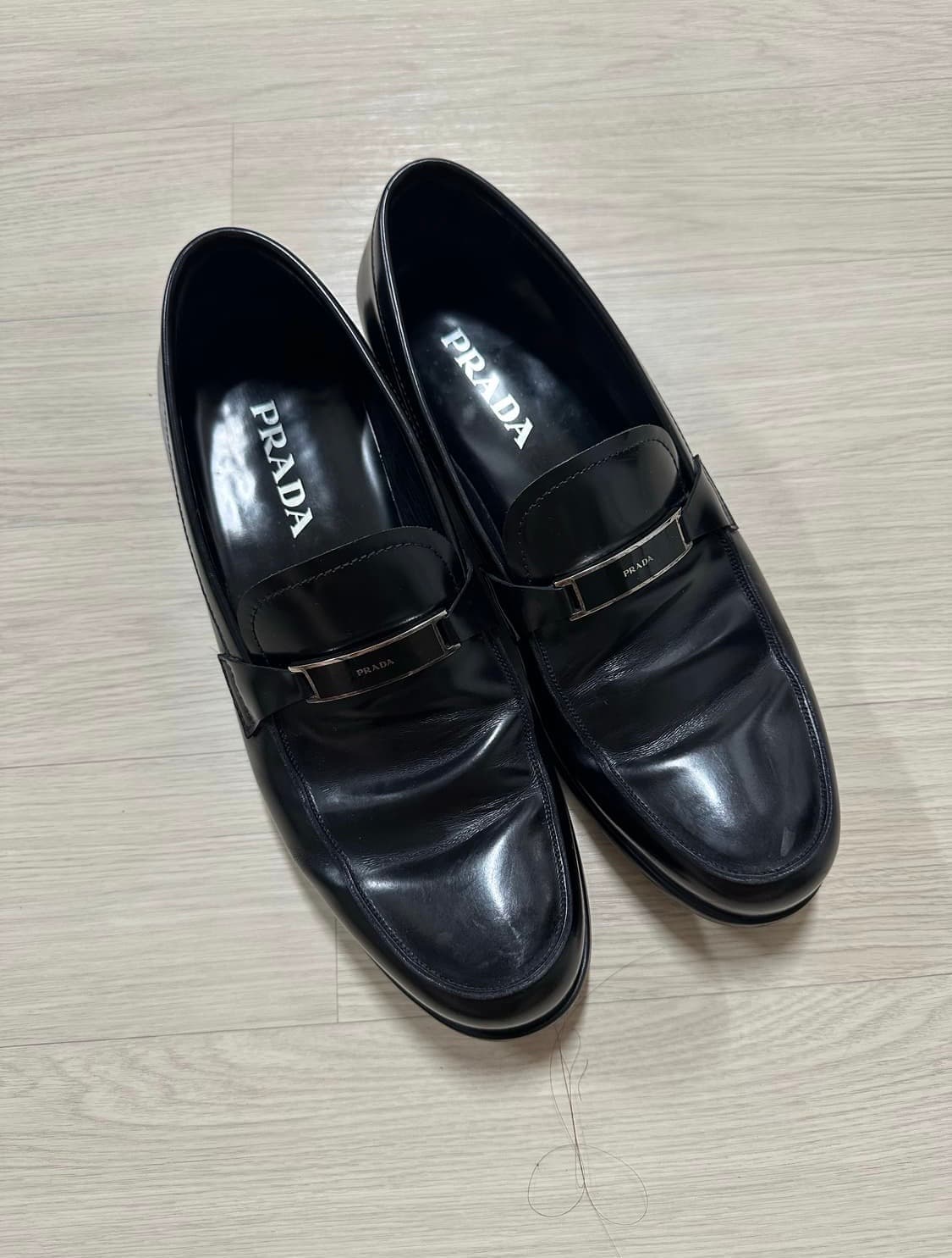 PRADA Metal Buckle Leather Loafer 상품이미지1
