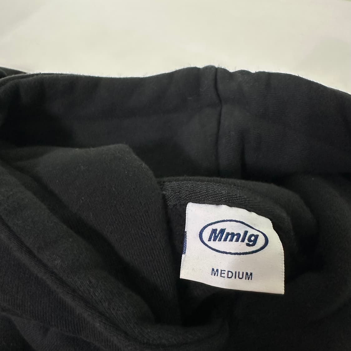 M 100 MMLG 오버핏 빅로고 블랙 스웻후드티 상품이미지4