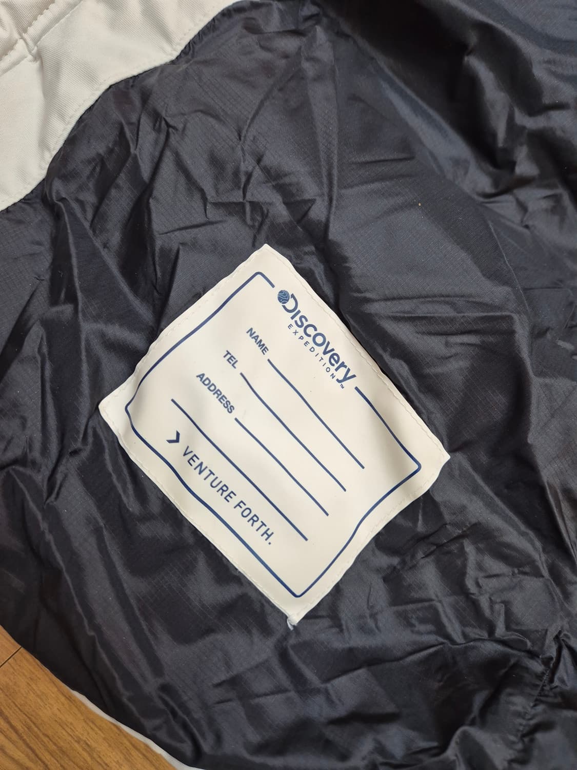 디스커버리 익스페디션 키즈 롱패딩 아이보리 색상입니다. 사이즈는 130입 상품이미지6