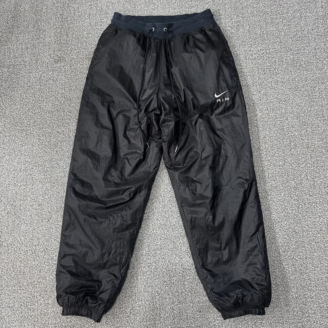 나이키 에어 원터라이즈 다운 필 팬츠 상품이미지1