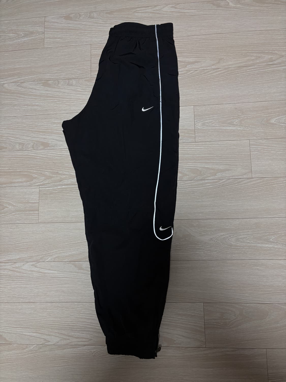 나이키 솔로스우시 트랙 팬츠 L 상품이미지1