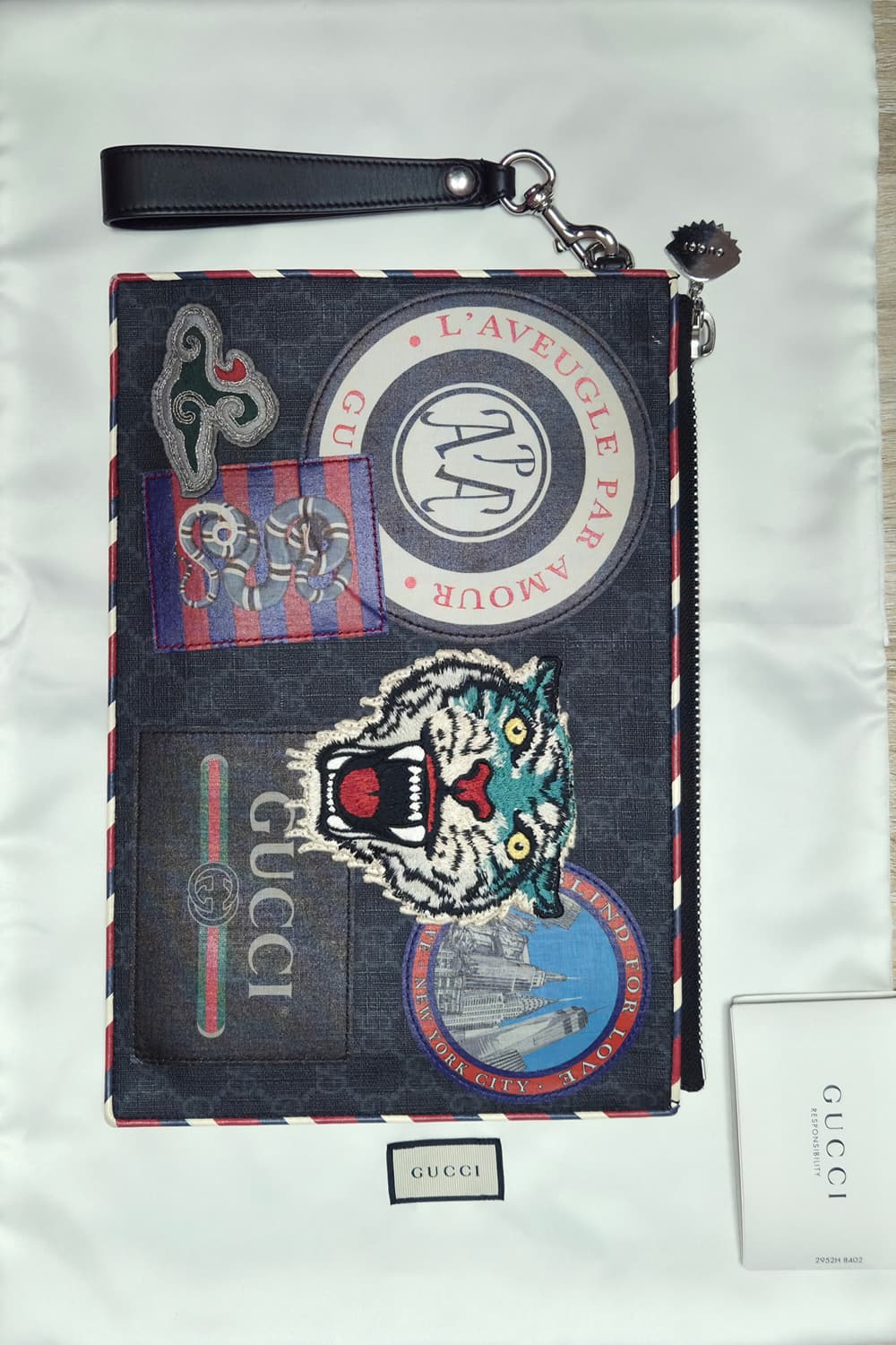 구찌 나이트 쿠리에 GG 수프림 클러치 상품이미지1