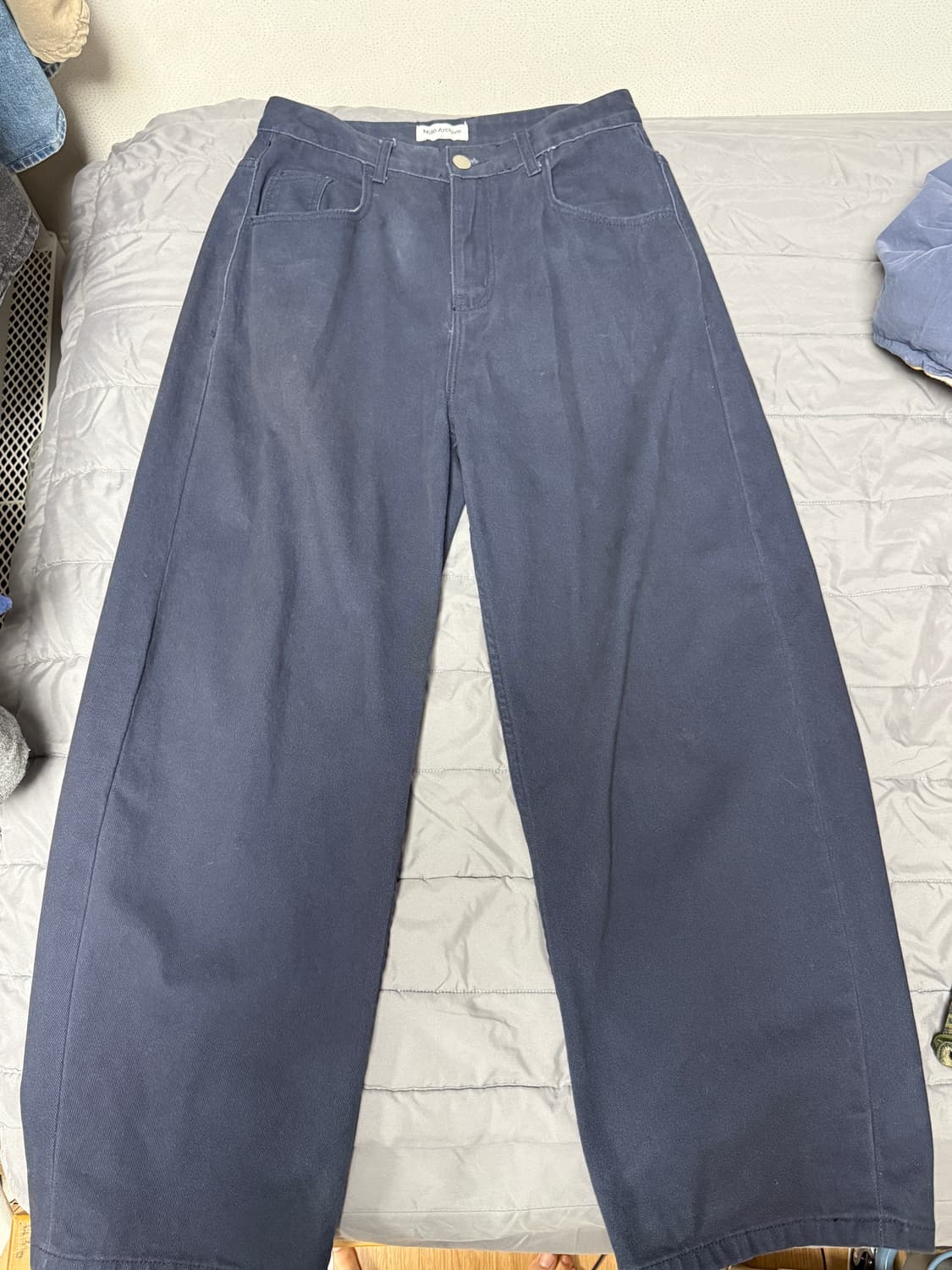 밀로 아카이브 리플렉트 커브드 팬츠 네이비 상품이미지1