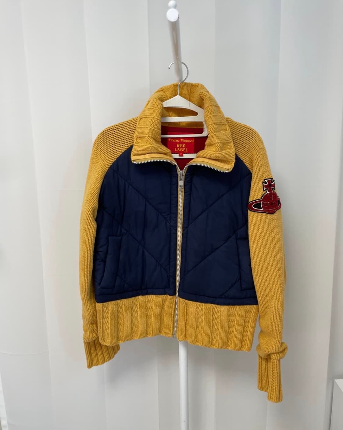 비비안웨스트우드 하이넥 빅로고 블루종 니트패딩  상품이미지1