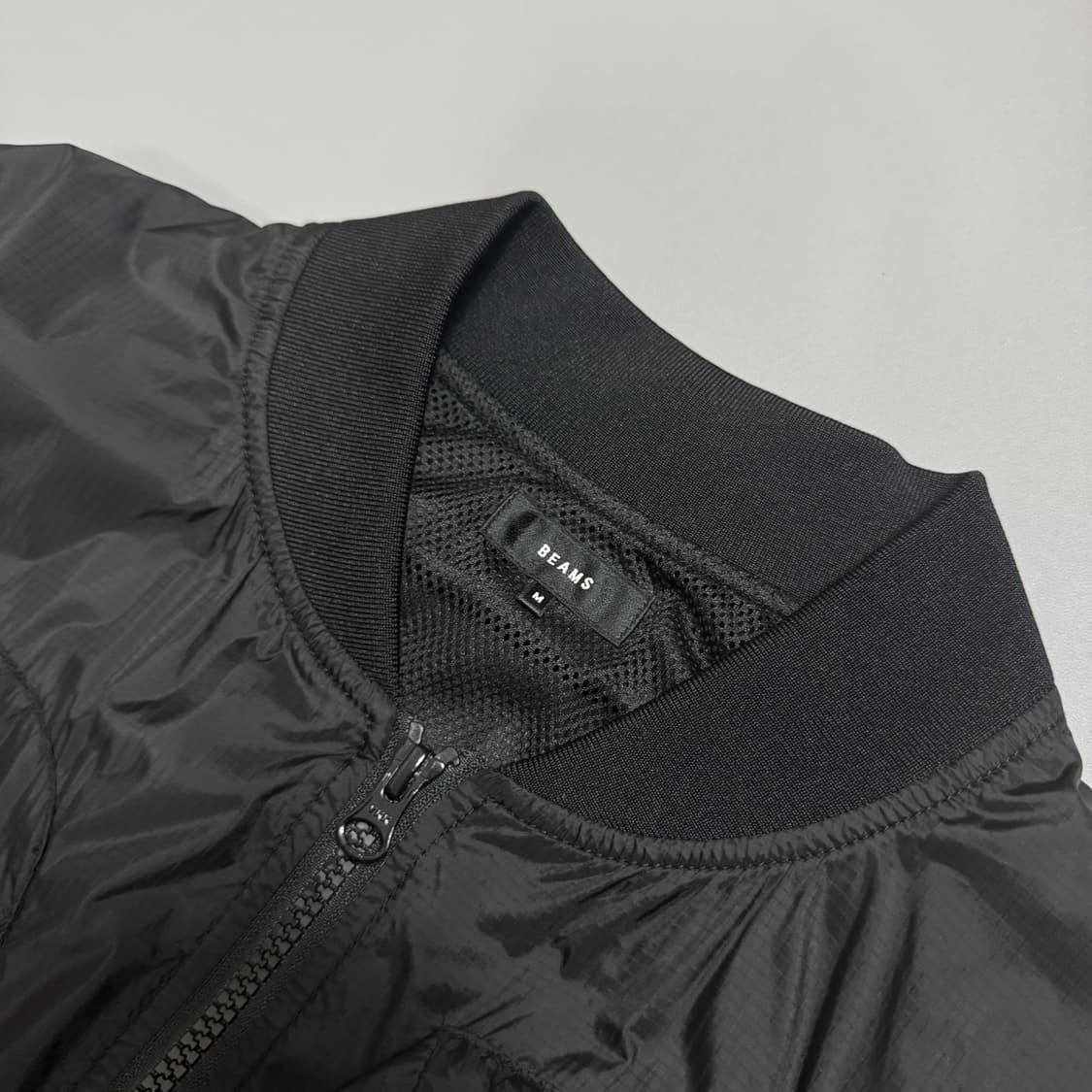 빔즈(BEAMS) 블랙 립스탑 워터프루프 멀티포켓 MA-1 플라이트 자켓 상품이미지3