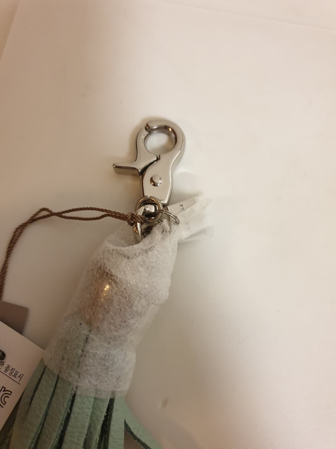 코치넬리 백참 태슬 키링 상품이미지3