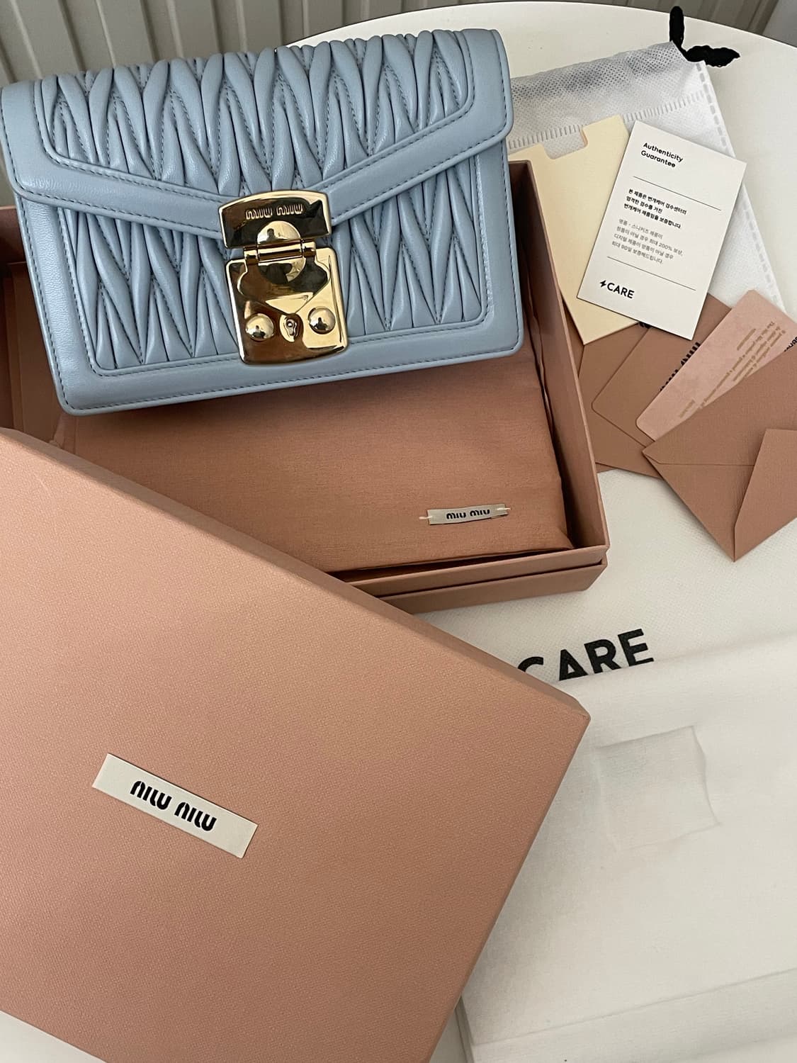 미우미우 마테라쎄 체인 크로스백 상품이미지1