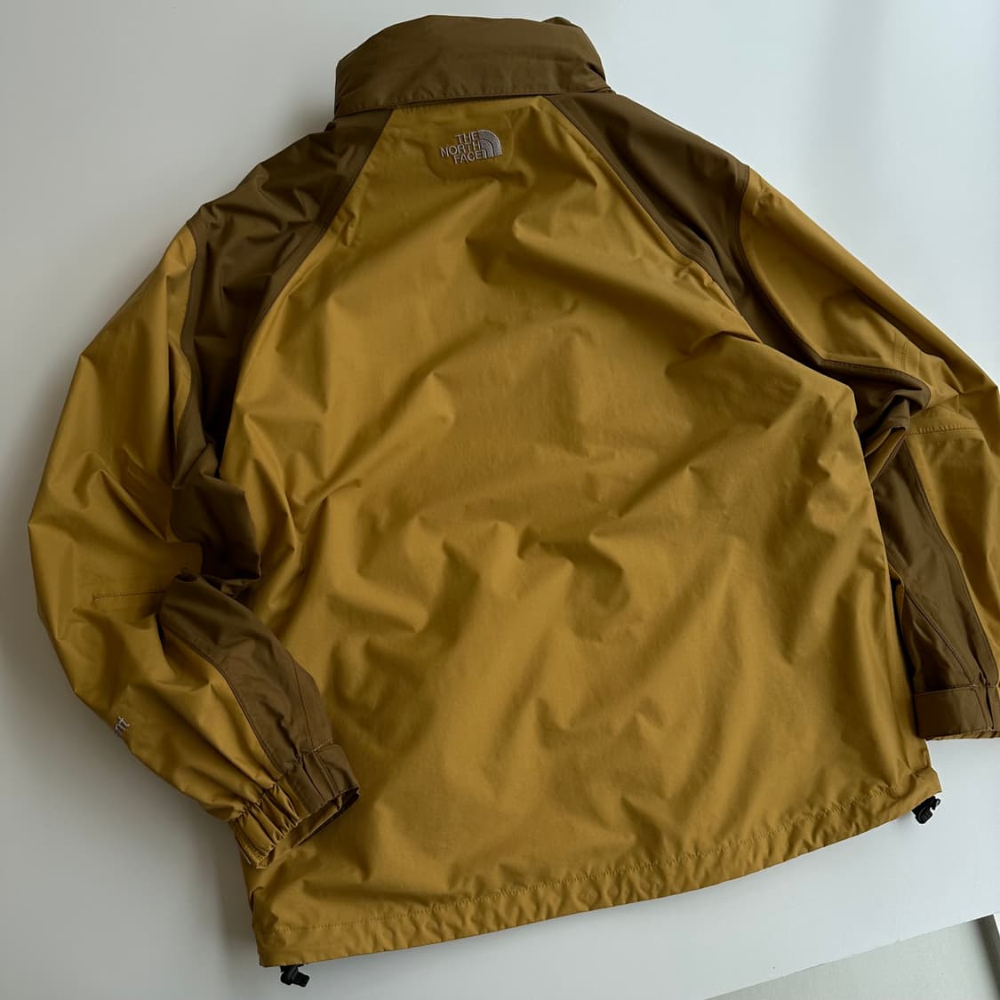 노스페이스00‘s머스타드브라운 하이벤트히든후드 윈드자 상품이미지2