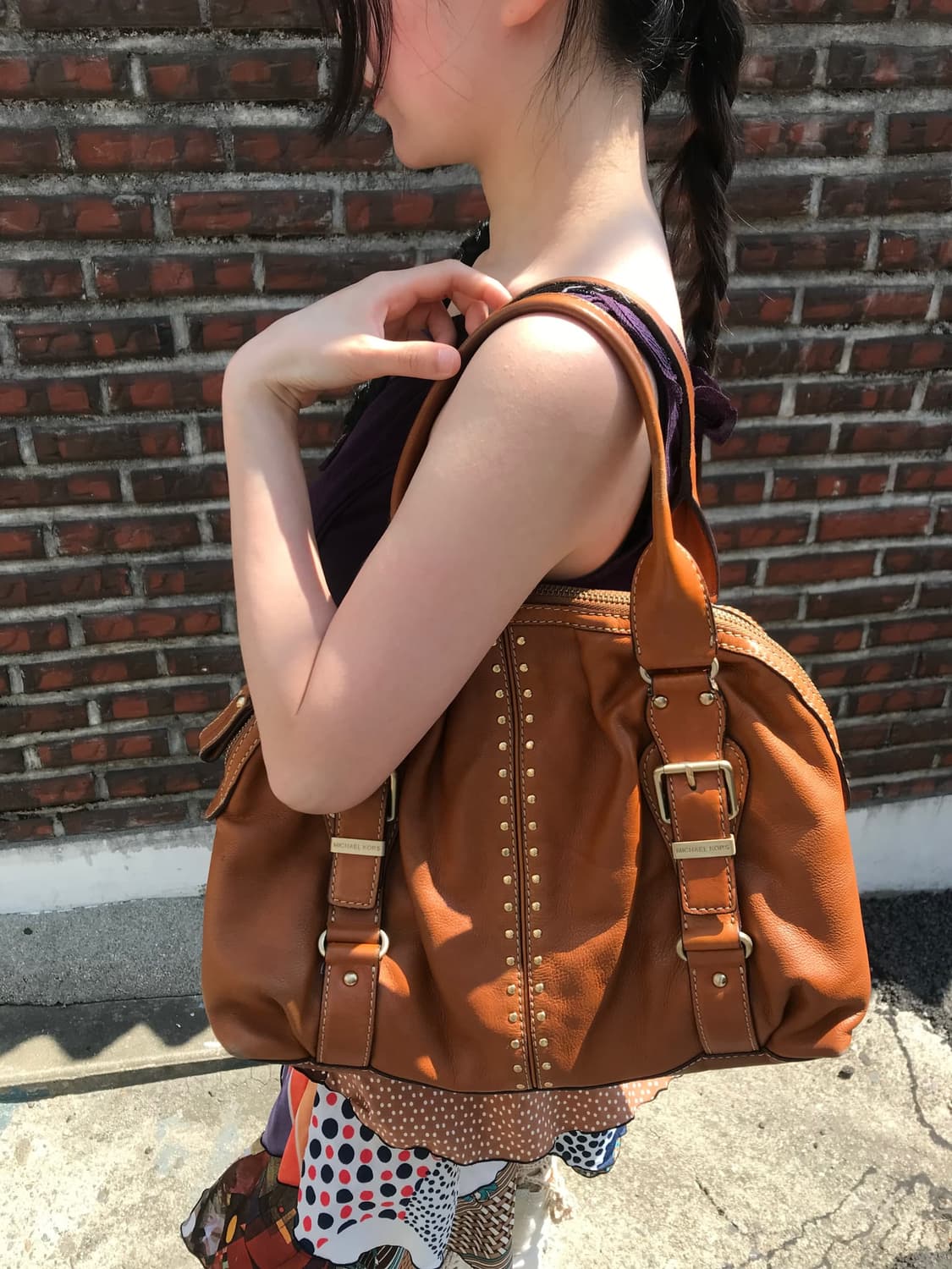 Michael Kore brown buckled leather bag 상품이미지1