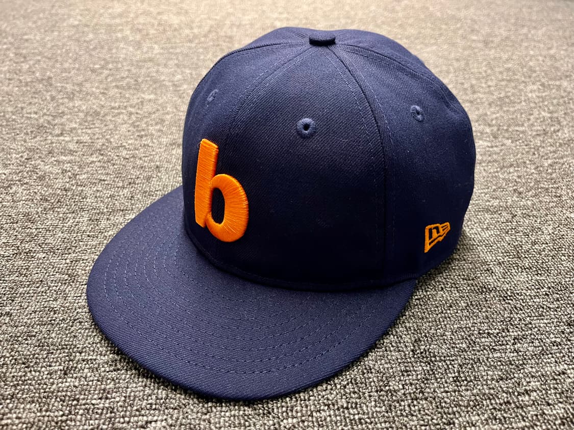 발란사 X 뉴에라 b캡 네이비/오렌지 7 5/8 상품이미지1