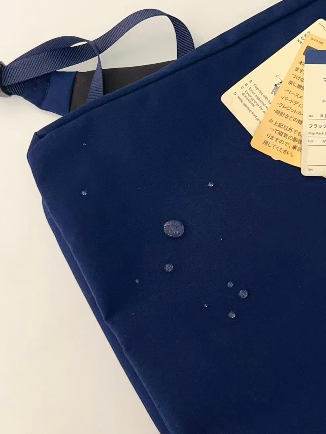 (새상품)몽벨 롤 탑 플랩팩 15 백팩 네이비 상품이미지4