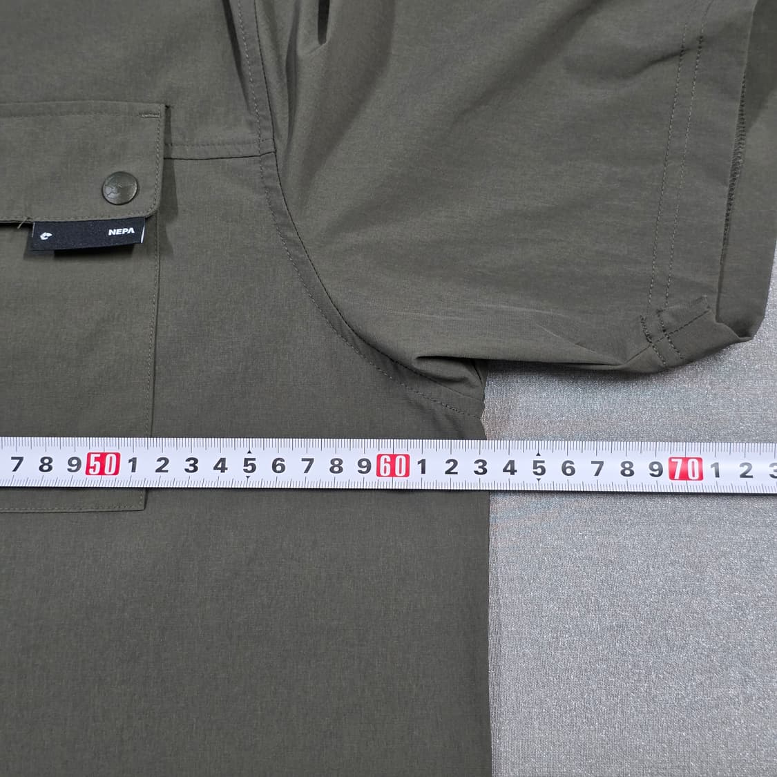 110 네파 우븐 반팔 웜업 바람막이 상품이미지7