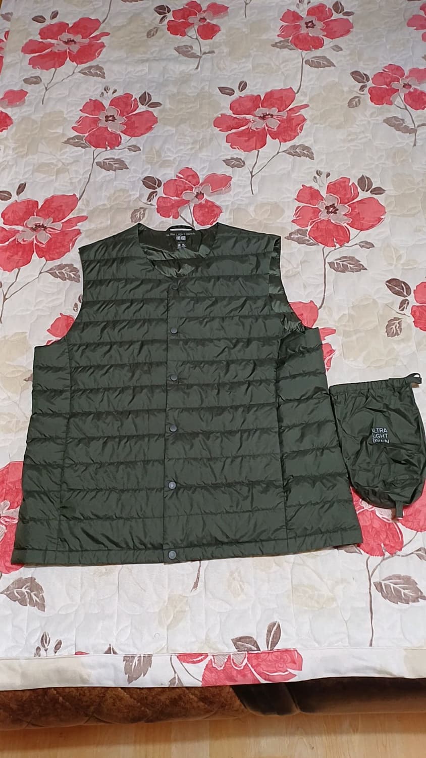 유니클로 오리털 초경량조끼 100 가슴53 기장66 상품이미지1