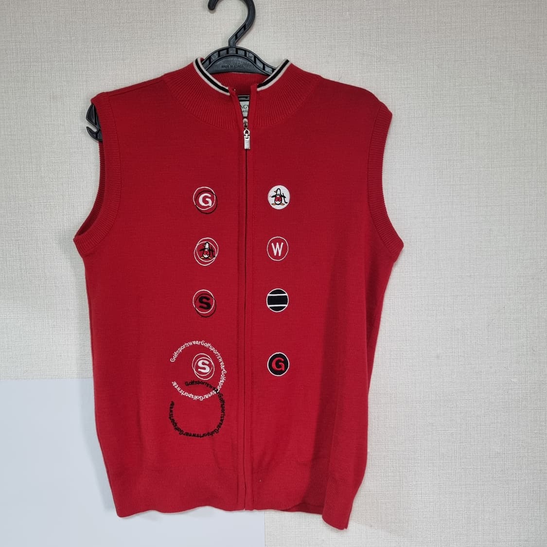 먼싱웨어 민소매 자켓 상품이미지1