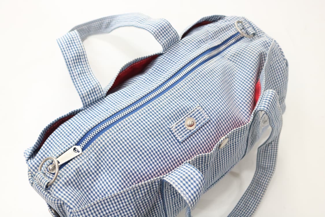 포터 x 아트모스 협업 깅엄 체크 더플백 상품이미지5