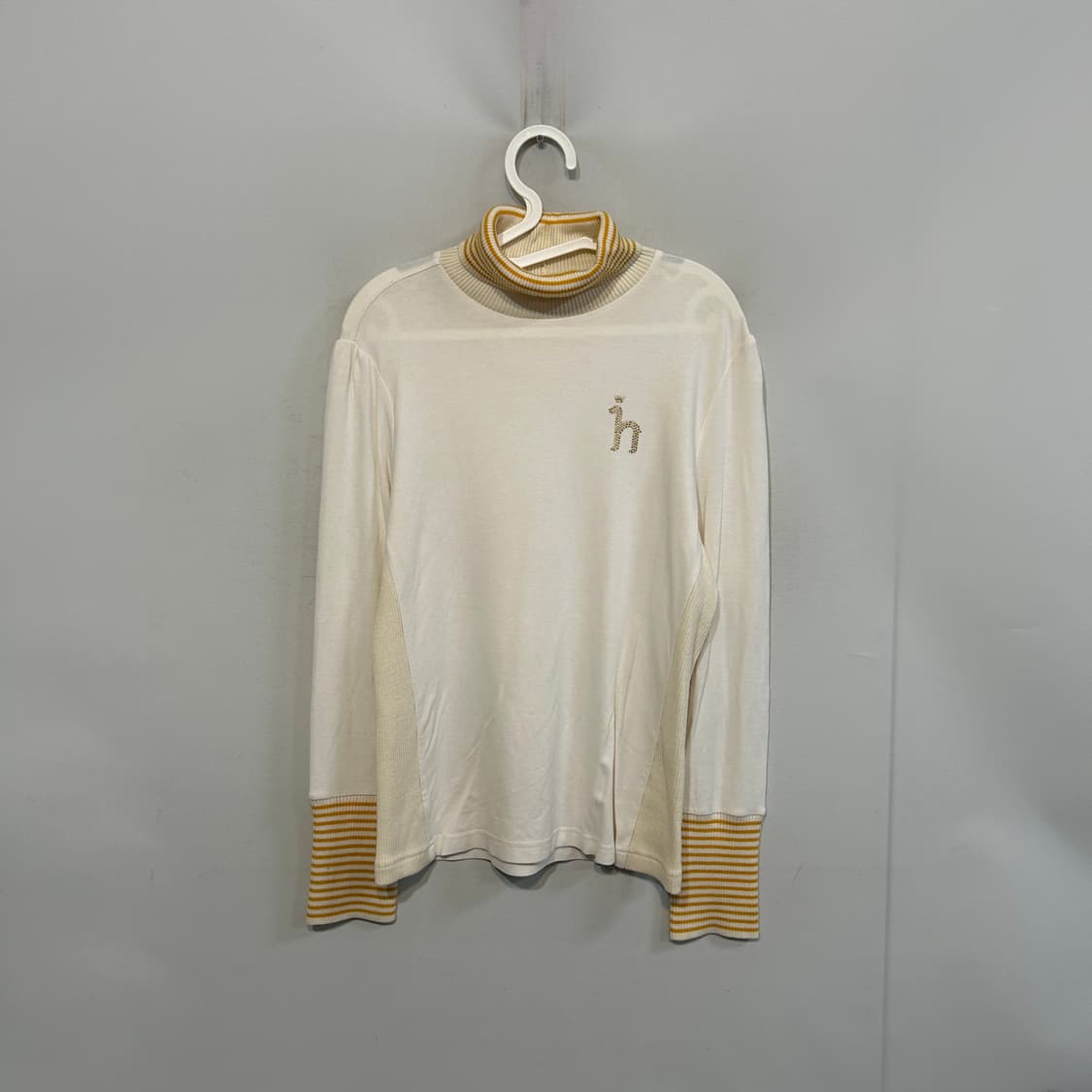 헤지스 골프 여성 하이넥 니트 95 상품이미지1