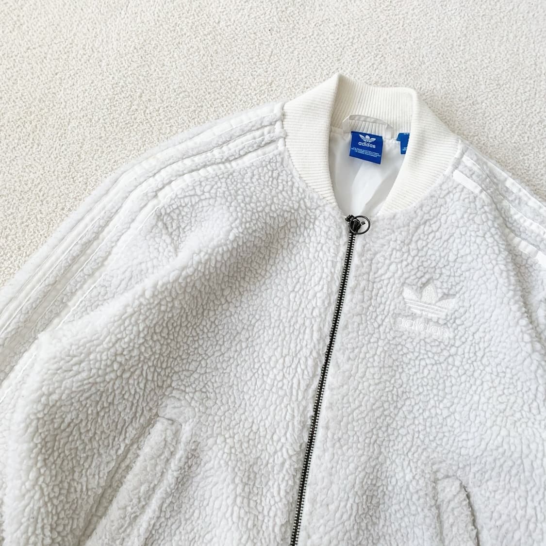 아디다스 파이어버드 화이트 뽀글이 자켓 상품이미지1