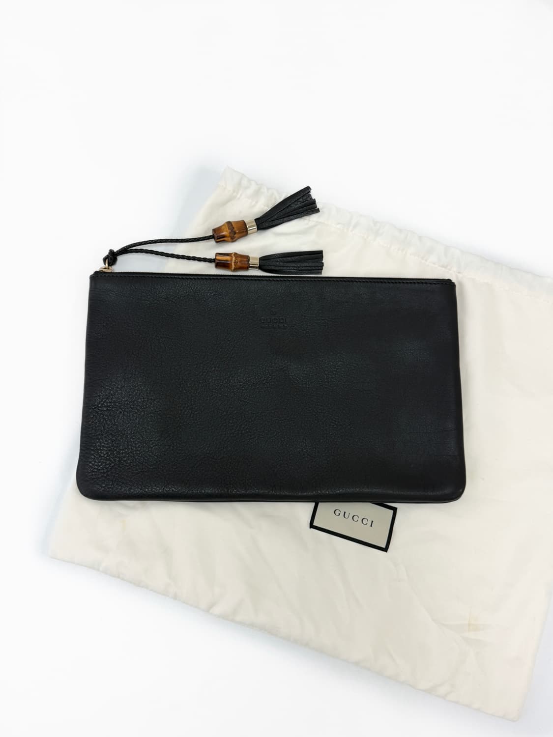 구찌 뱀부 태슬 레더 클러치백 상품이미지1