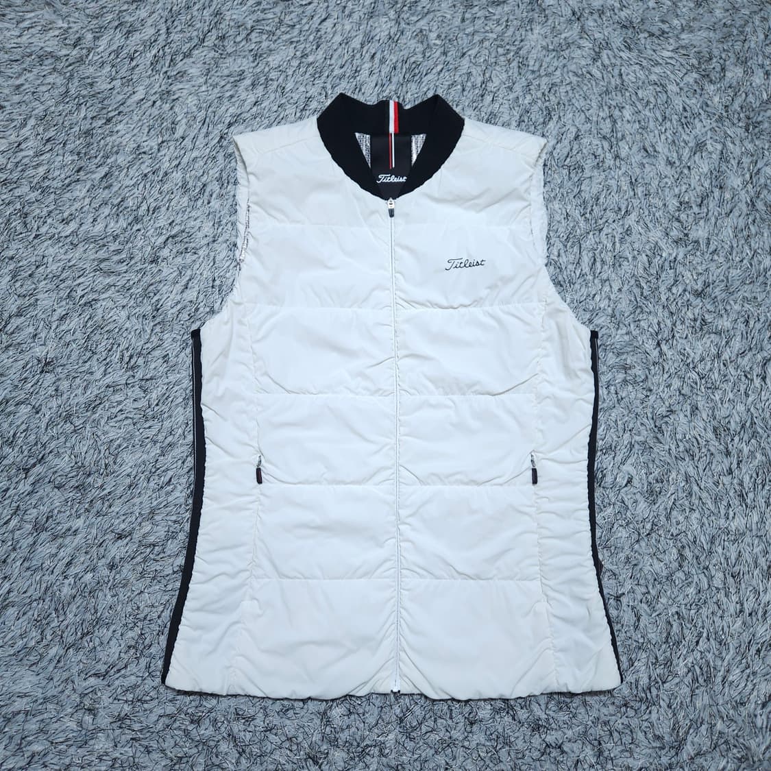 타이틀리스트) L 여자 패커블 발수 패딩조끼 / 왕눈이샵 상품이미지1