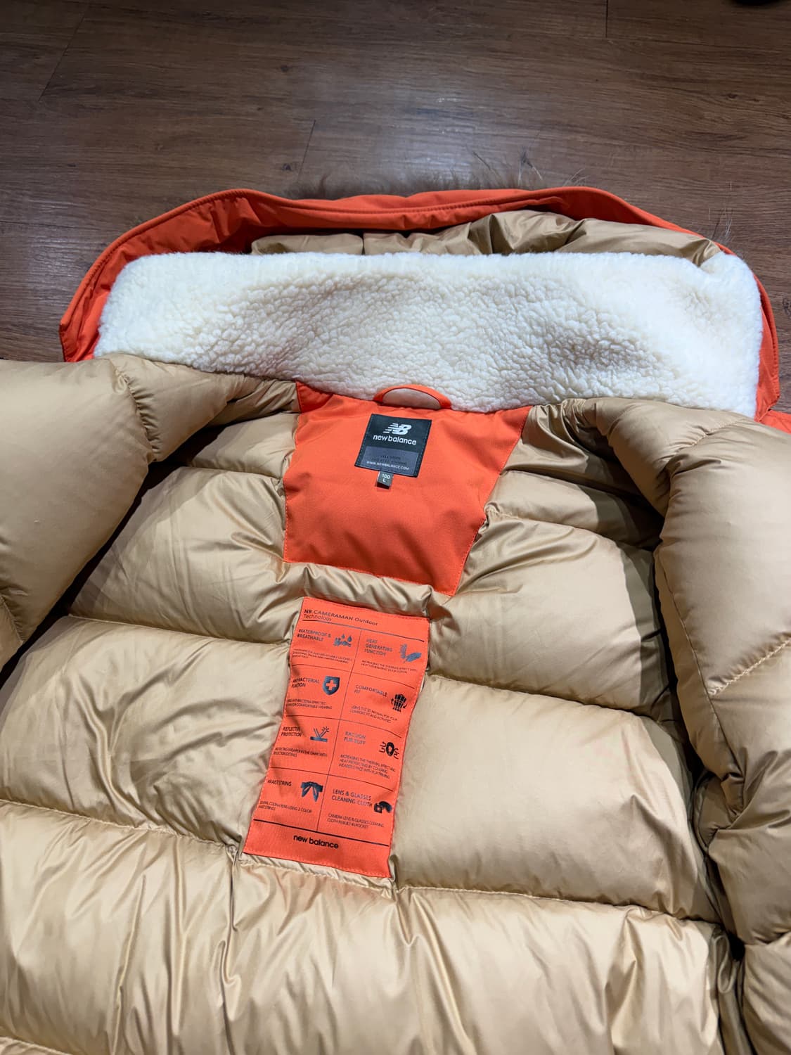 [L]뉴발란스 카메라맨 오렌지 패딩(상태 A급) 상품이미지4