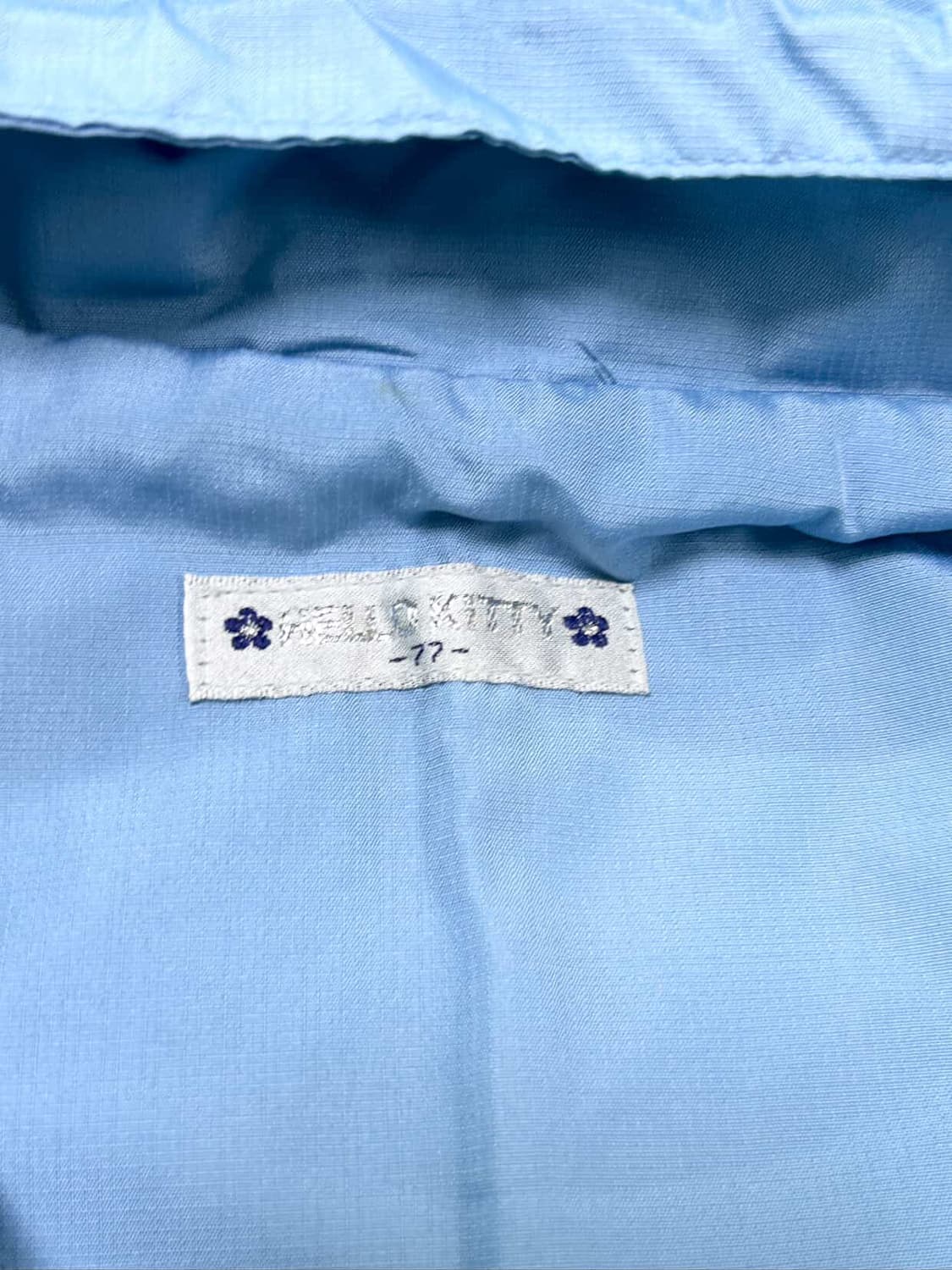 헬로키티 하늘 빅로고 바람막이 상품이미지8