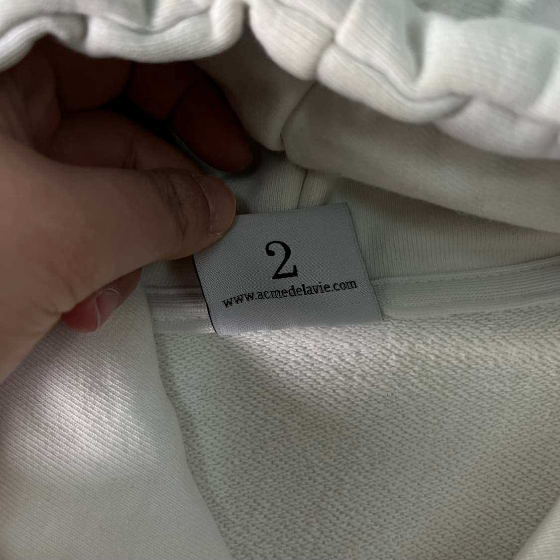 105 아크메드라비 화이트 후드티 상품이미지5