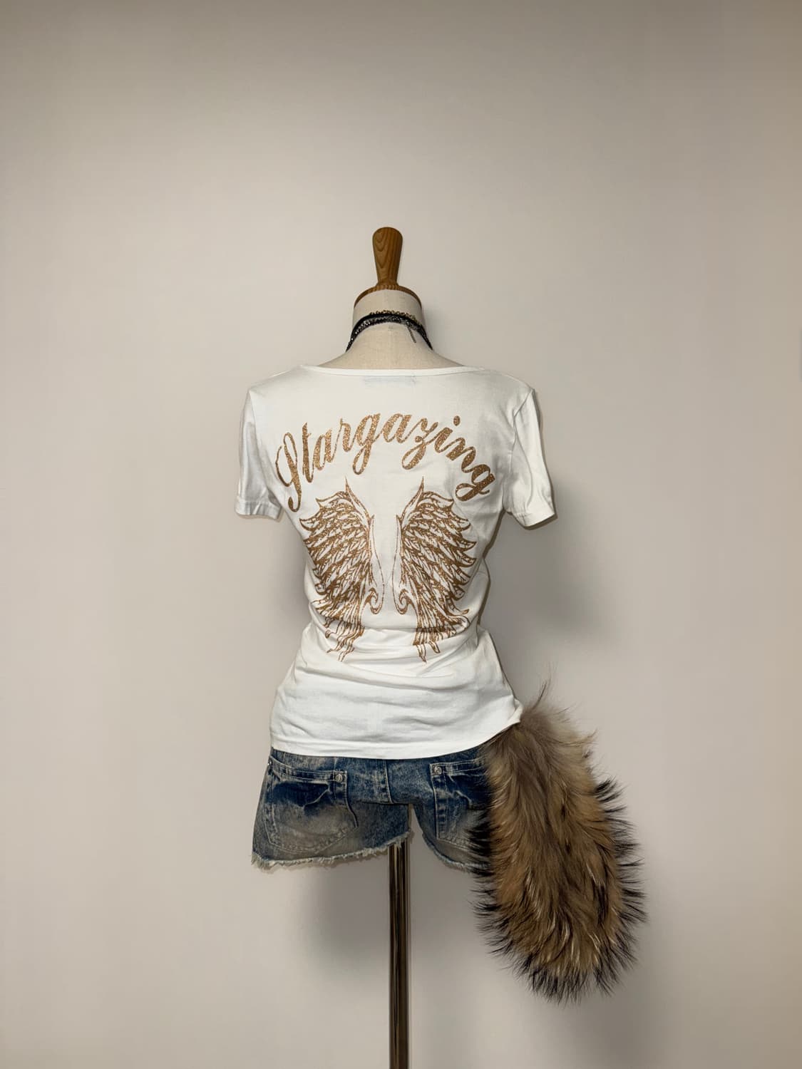 날개 프린팅 오네갸루 탑 상품이미지1