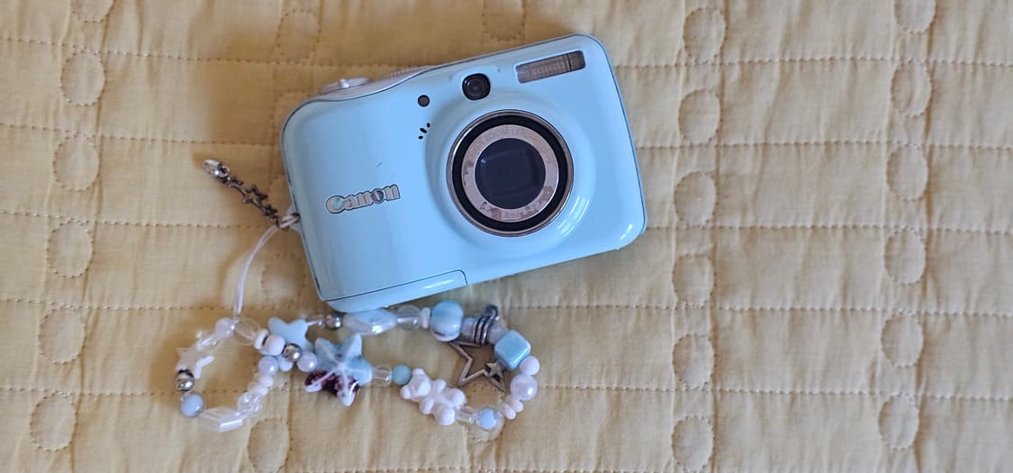 Canon powershot E1 블루 색상 판매합니다!! (작례 첨부) 상품이미지1