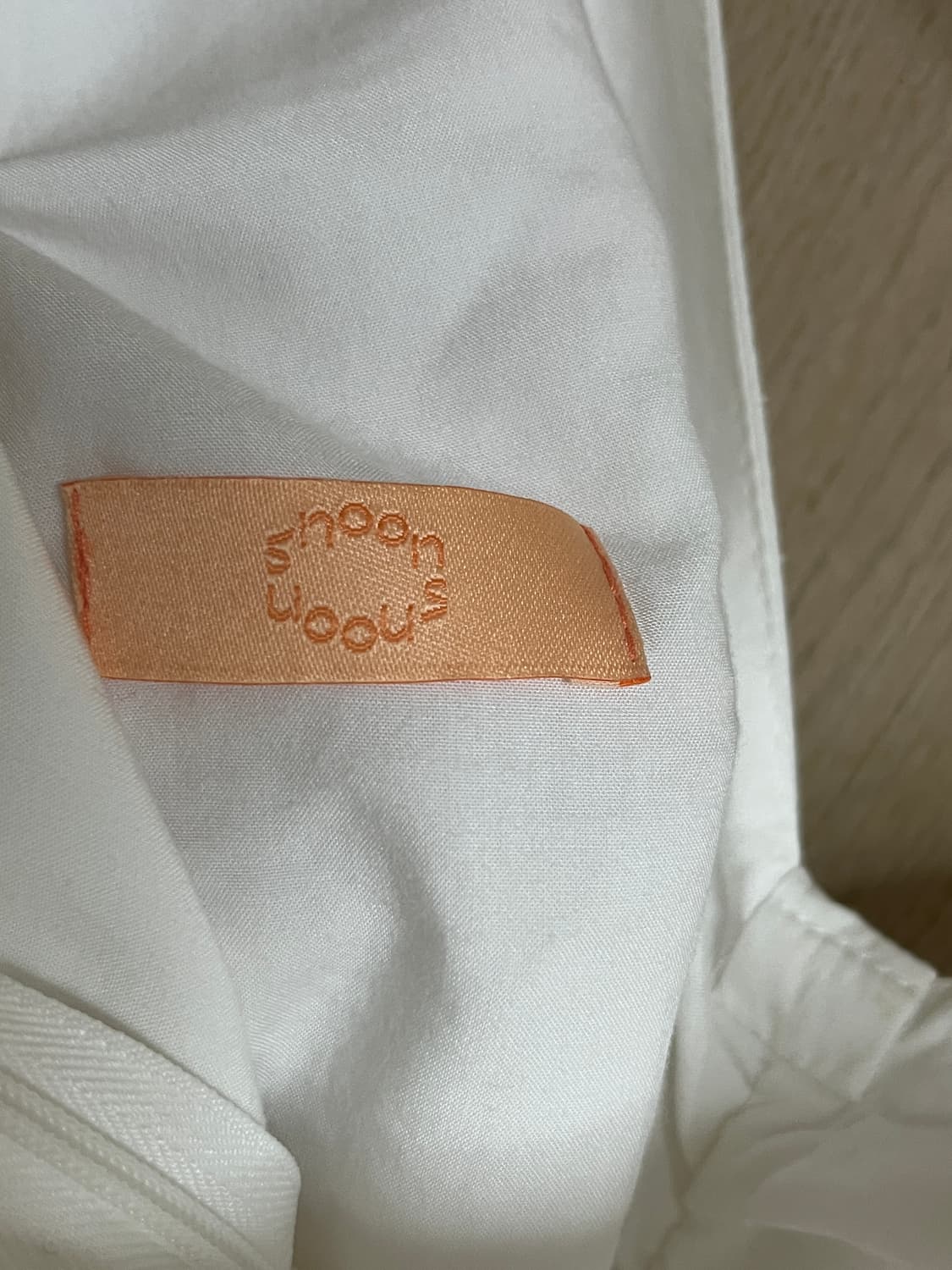 시눈 리본 타이 슬리브리스 화이트 상품이미지4