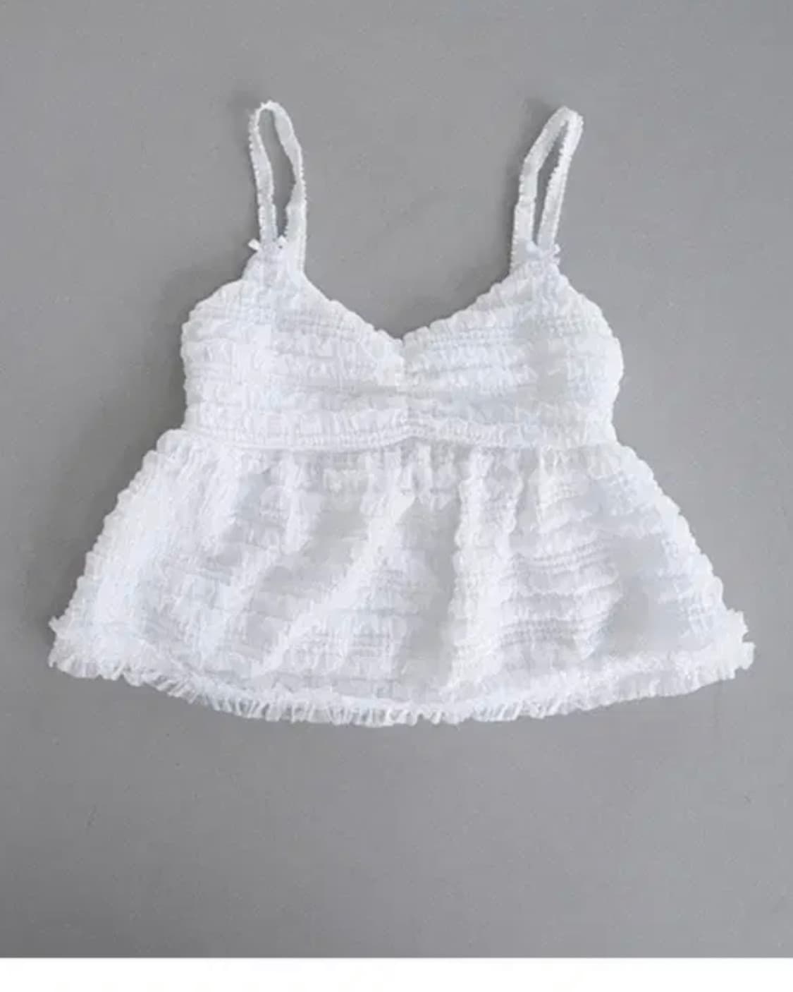 클라따 폼폼 슬리브리스 화이트 상품이미지1