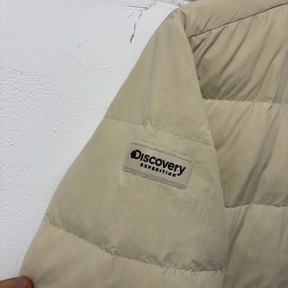 디스커버리 베이지 픽토르U 경량 패딩 상품이미지3