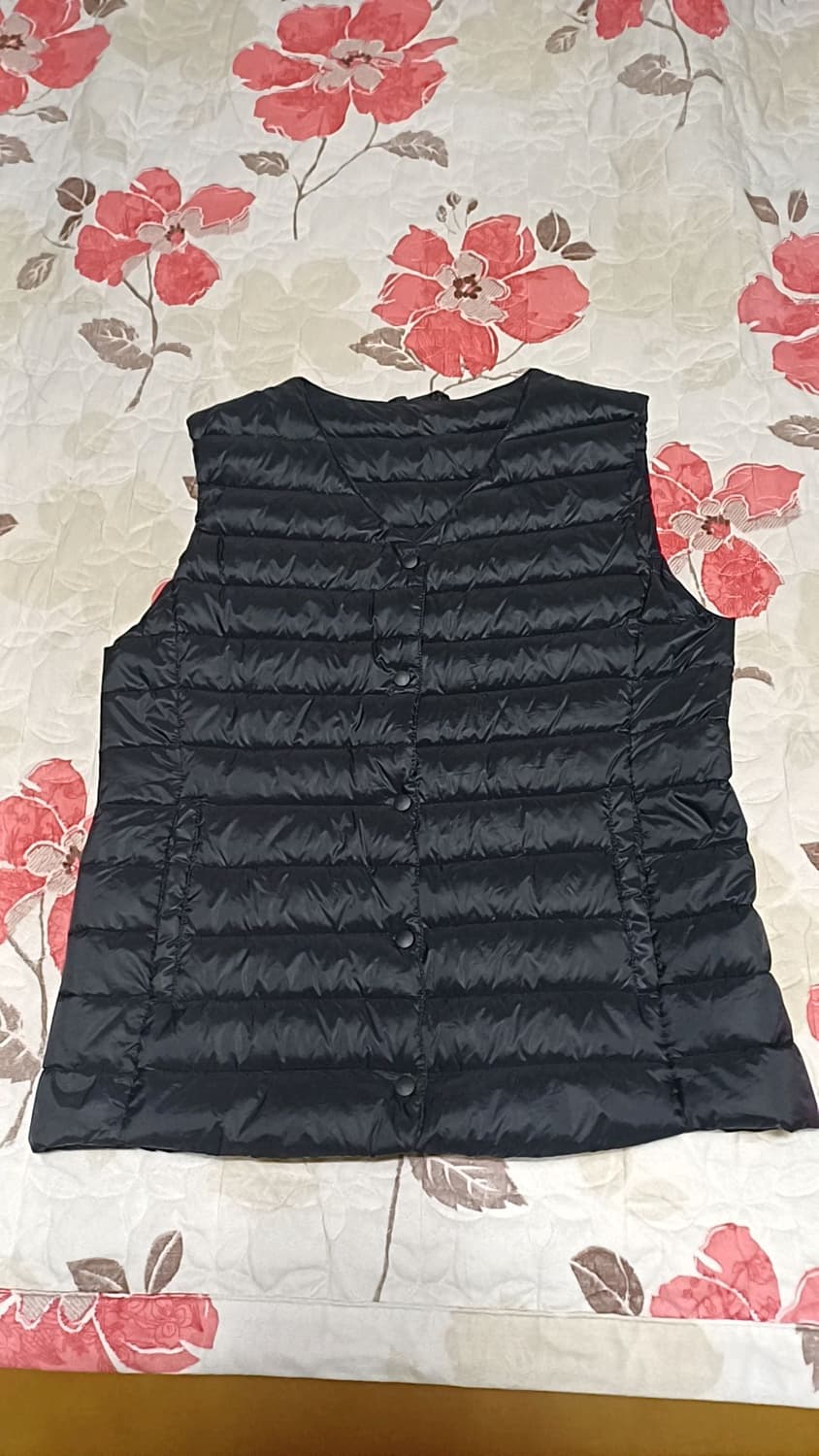 스파오 오리털경량조끼 100 여성77 가슴49 기장62 상품이미지1