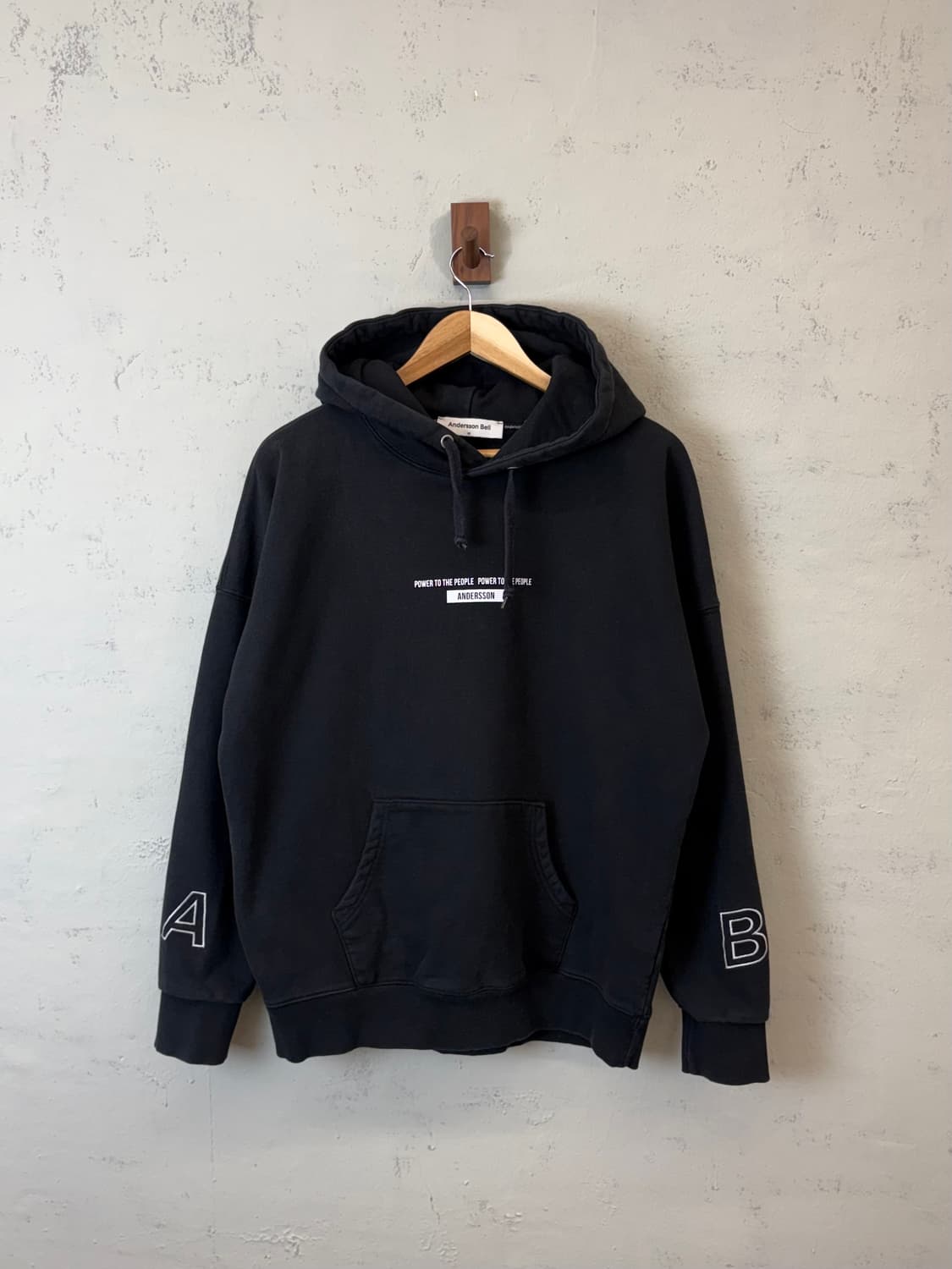 앤더슨벨 블랙 후드티 상품이미지1