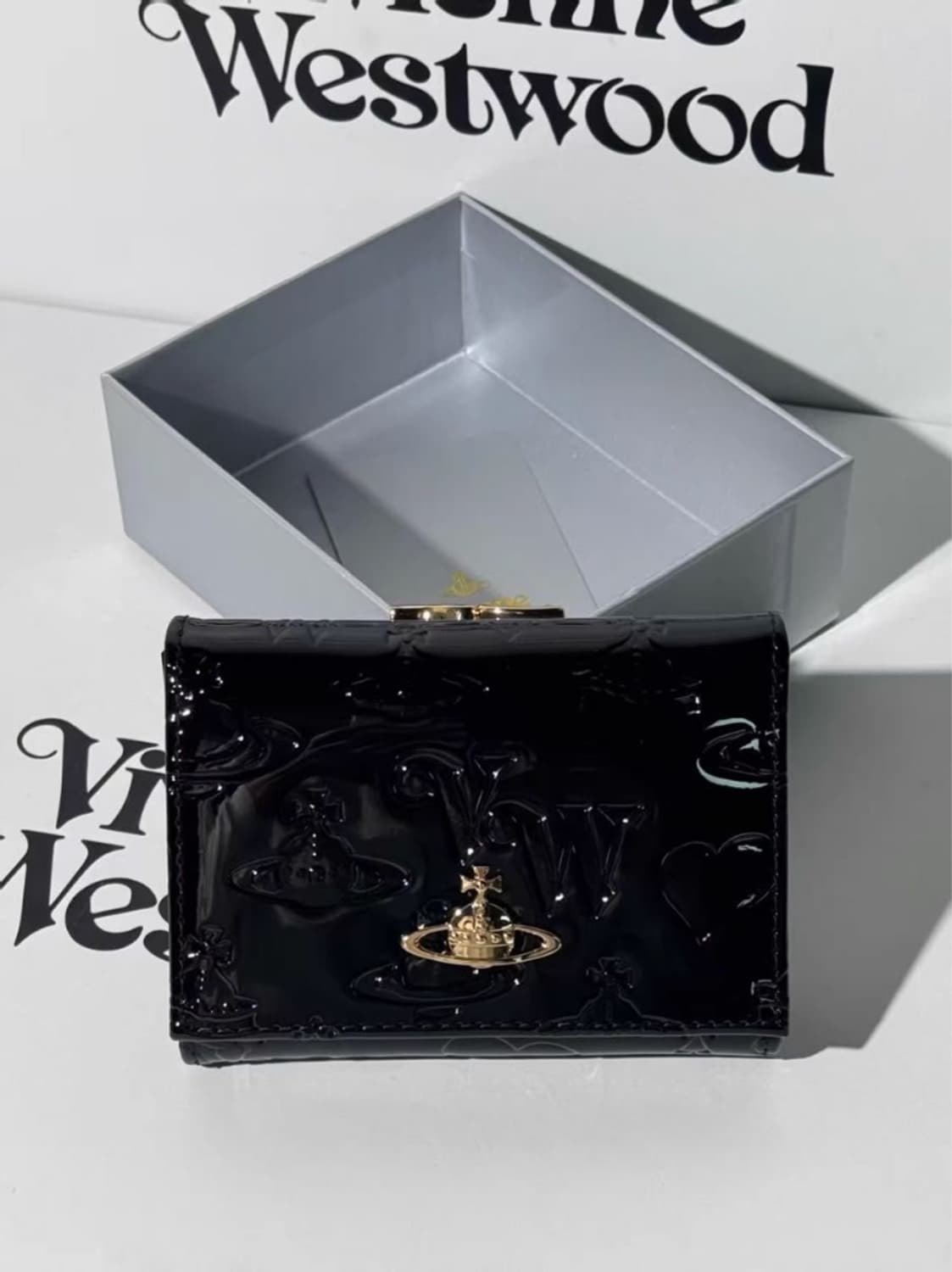 비비안웨스트우드 아카이브 금장 orb 펀칭 유광 블랙레더 하프월렛 반지갑 상품이미지1