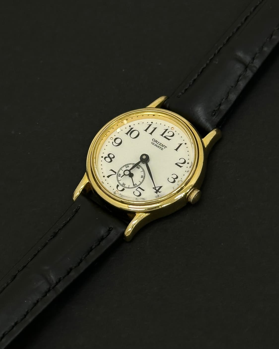 오리엔트 스몰세컨즈 라운드 쿼츠 시계 상품이미지3