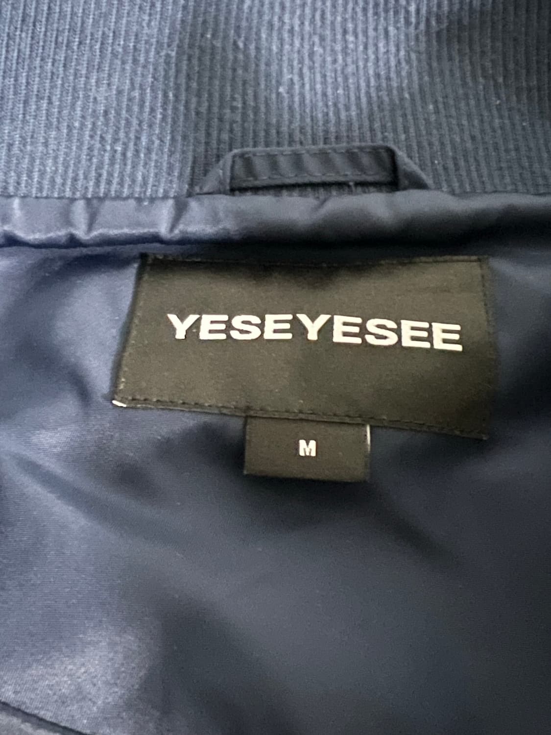 예스아이씨 하이넥 스타디움 자켓 네이비 상품이미지4