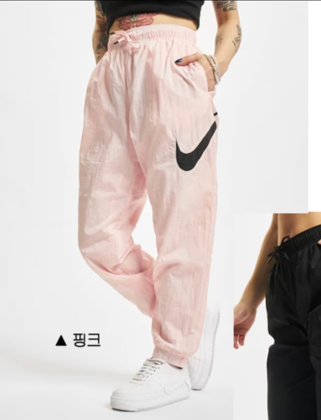 나이키 에센셜 우븐 트레이닝 팬츠 핑크 상품이미지1