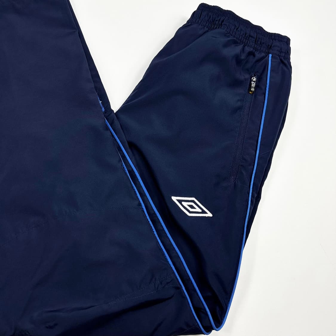 엄브로 다이아 로고 네이비 우븐팬츠 (M) 상품이미지1