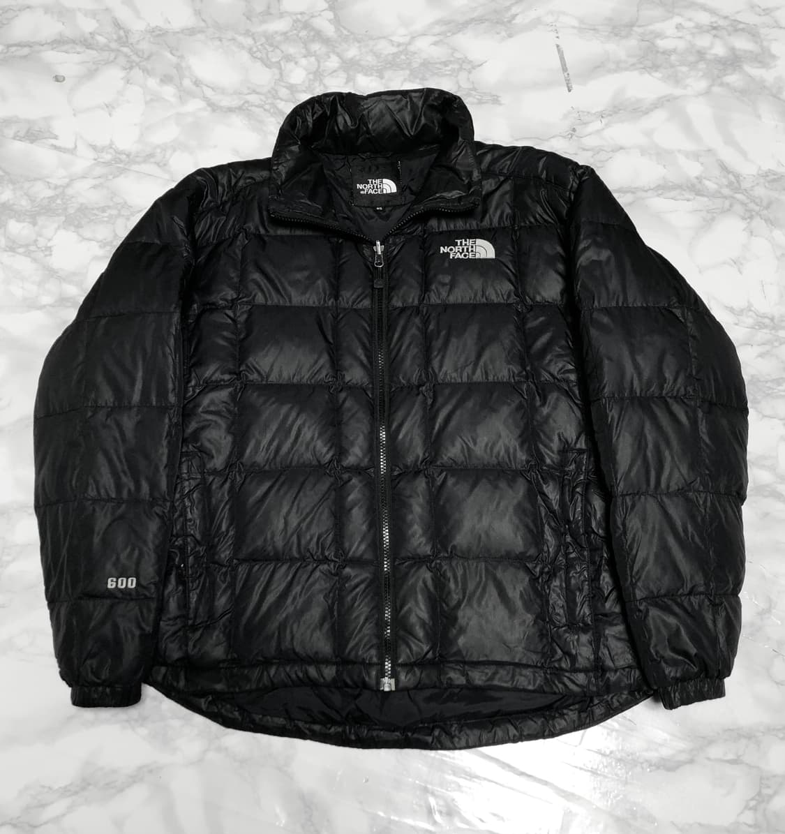 노스페이스 600 경량패딩 자켓 남성용 상품이미지1
