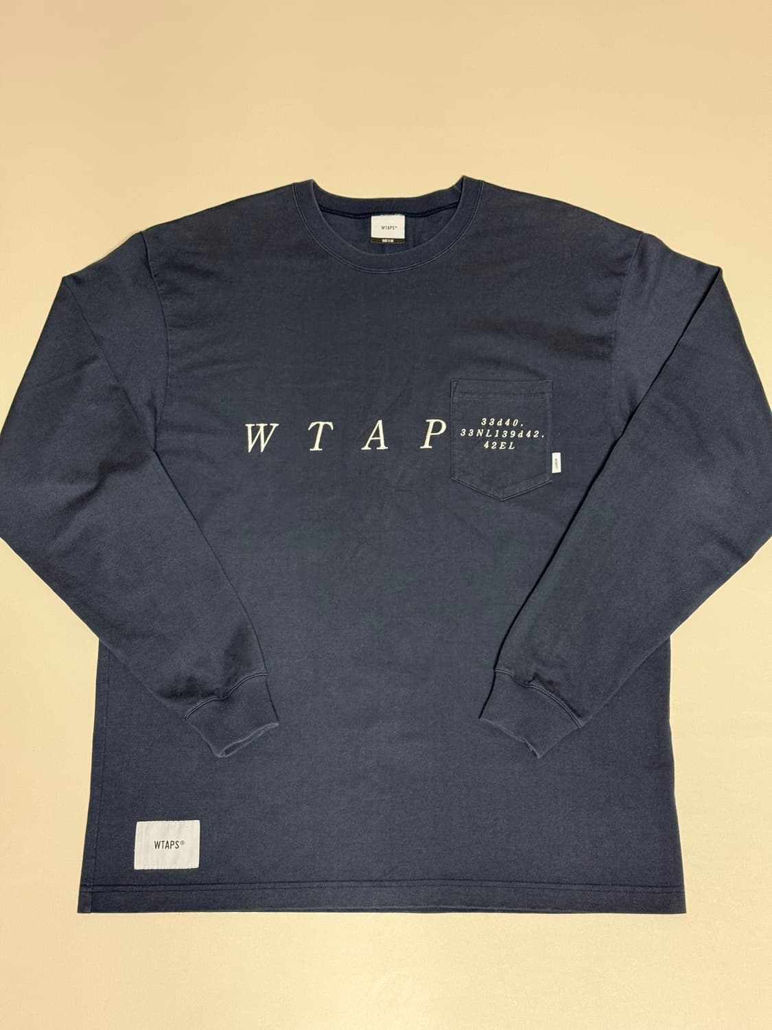 WTAPS 더블탭스 네이비 포켓 긴팔티셔츠 3 상품이미지1