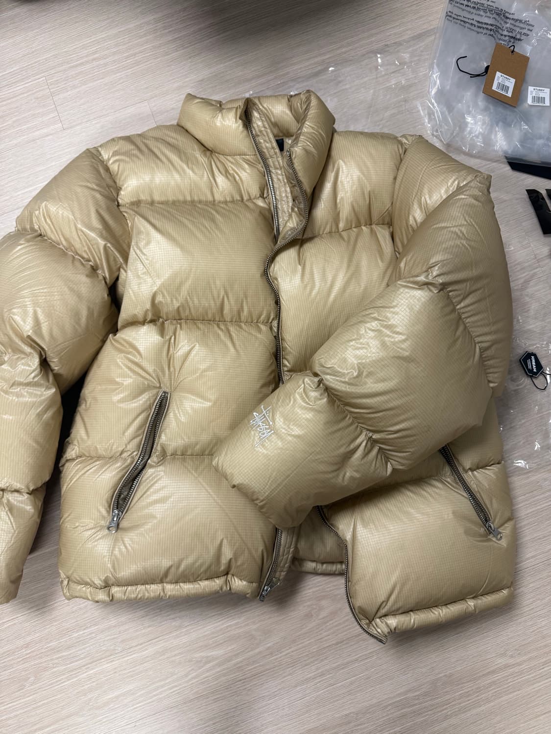 스투시 다운 퍼퍼 파라슈트 립스탑 코요테 M 상품이미지1
