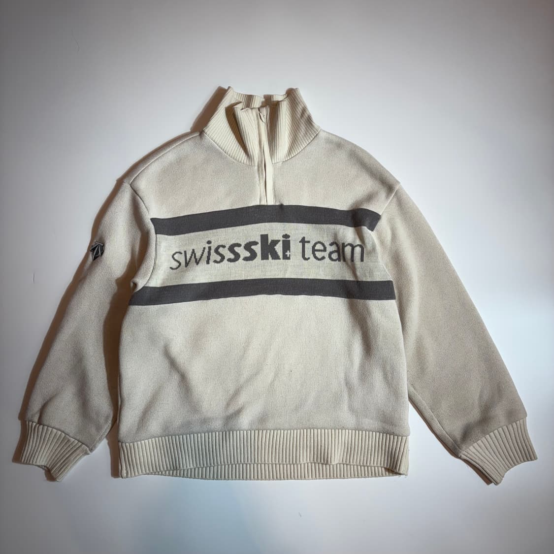 데상트 SwissSki Team 하프넥 니트 상품이미지1