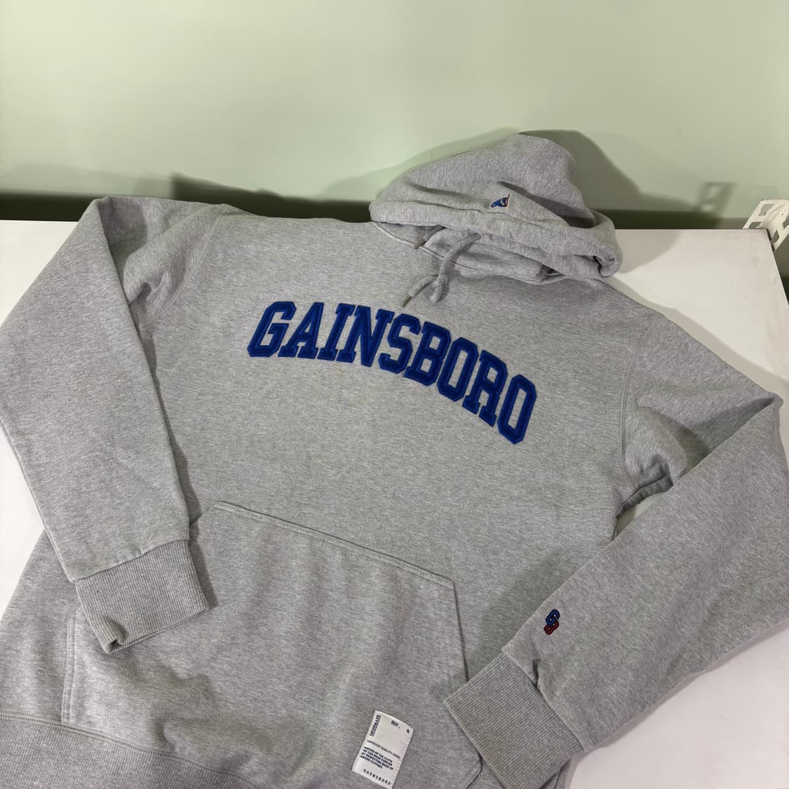 L 게인소보로 그레이 블루로고 후드티 상품이미지1